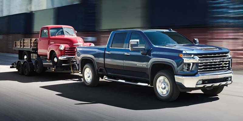 silverados 2500 in red and blue